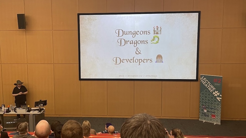 Session 1 of the conference, with the logo on the screen saying Dungeons, Dragons & Developers