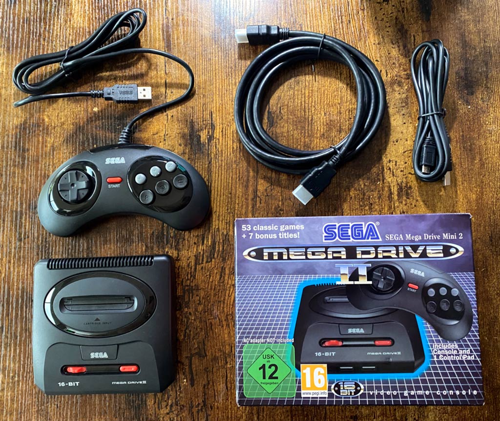 A picture showing Whats in the Sega Mega Drive 2 box